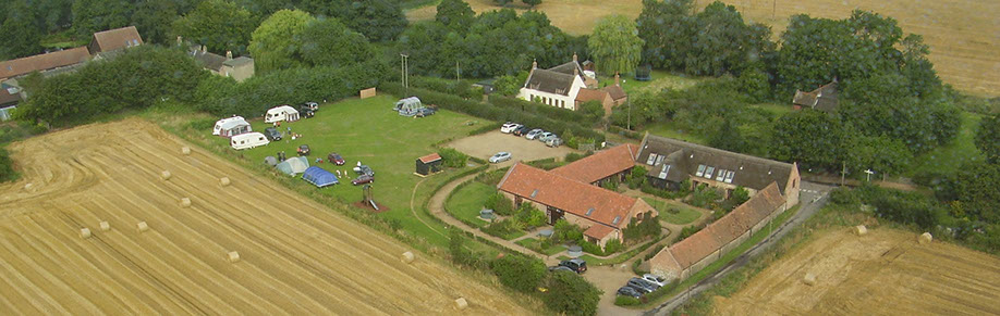 Aerial shot of Grove Barn Holiday Barns and the campsite in Catfield Norfolk.